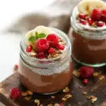 Chocolate chia pudding topped with banana and granola