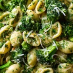 Broccoli pasta served in a bowl with parmesan