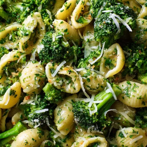 Broccoli pasta served in a bowl with parmesan