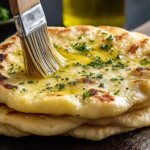 gluten free naan bread stacked warm with ghee